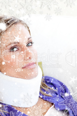 Young woman with a neck brace looking in the camera