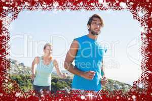 Fit couple jogging through countryside