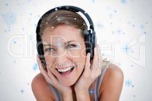 Close up of a smiling woman listening to music