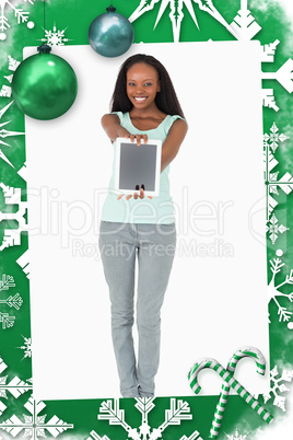 Composite image of woman presenting tablet on white background