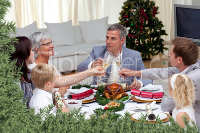 Family tusting in a christmas dinner with champagne