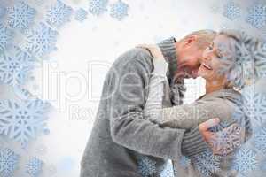 Happy mature couple in winter clothes