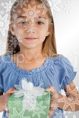 Composite image of portrait of a smiling little girl holding a w