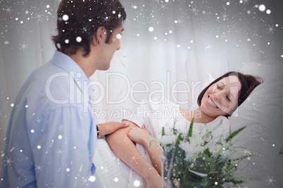 Composite image of man visiting his girlfriend in the hospital