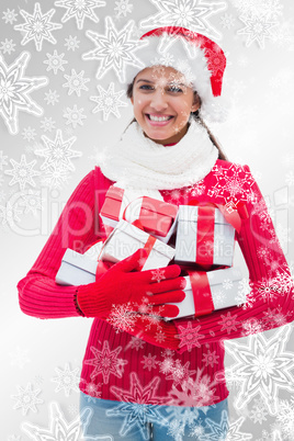 Beautiful festive woman holding gifts