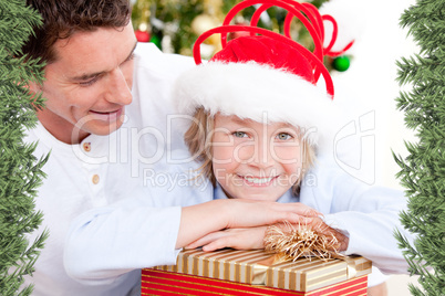 Handsome father celebrating christmas with his son