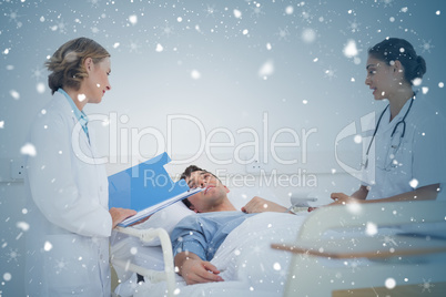 Composite image of doctors explaining the symptoms to a patient