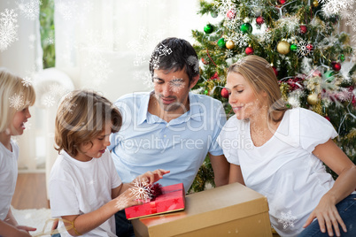 Cheerful family celebrating christmas together