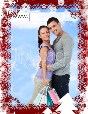 Happy couple with their shopping bags under address bar