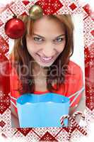 Composite image of teenager smiling after looking at her purchas