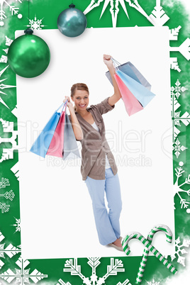 Composite image of happy woman with her shopping bags