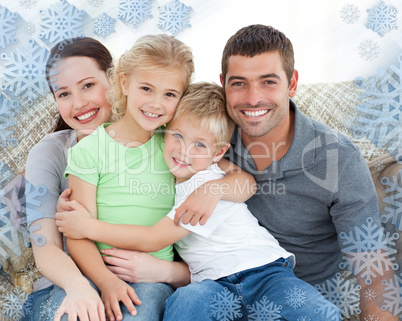 Adorable family sitting on the sofa and smiling