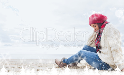 Composite image of woman in stylish warm clothing sitting at bea