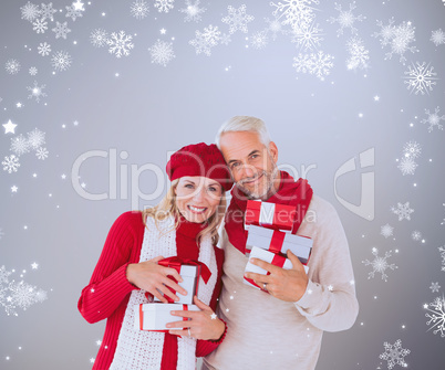 Happy festive couple with gifts