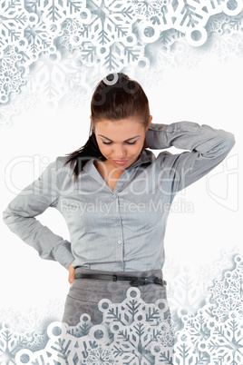 Portrait of a sad businesswoman having back pain