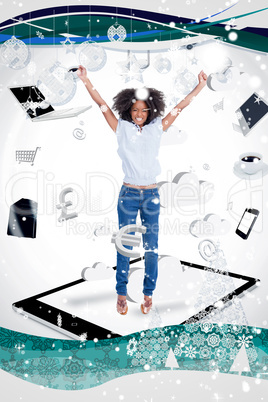 Composite image of cheerful woman jumping on a tablet pc