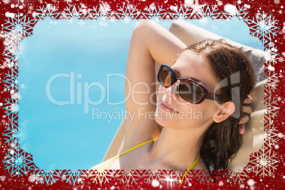 Composite image of cheerful woman by swimming pool