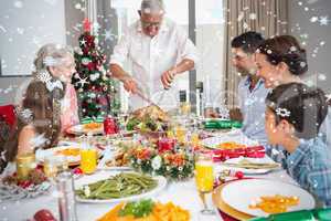 Extended family at dining table for christmas dinner