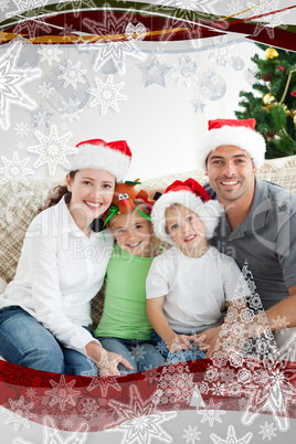 Adorable family at christmas sitting in the livingroom