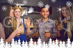 Composite image of happy friends holding beers