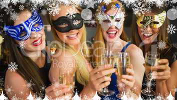 Composite image of smiling friends holding champagne glasses wea