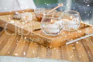 Candles and beauty treatment on tray