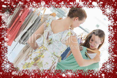 Young women shopping in clothes store