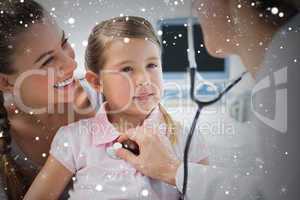 Girl being examined by female doctor