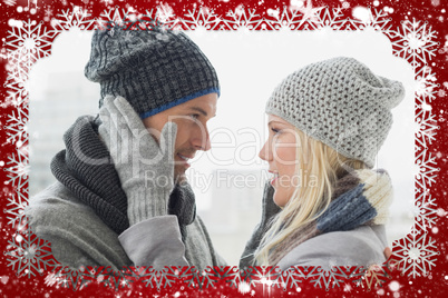 Cute couple in warm clothing hugging