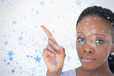 Close up of woman showing something next to her on white backgro