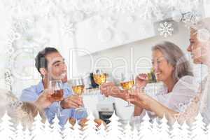 Composite image of family raising their glasses at thanksgiving