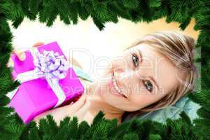 Smiling woman holding a present