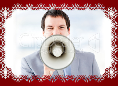 Portrait of an stressed businessman using a megaphone