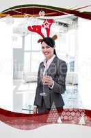 Smiling businesswoman with a novelty christmas hat toasting with