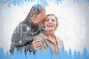 Happy mature couple in winter clothes