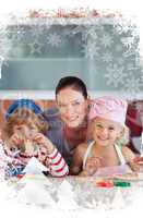 Cheerful mother baking with her children