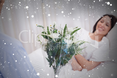 Composite image of flowers are brought to patient