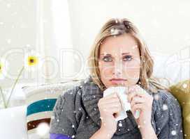 Composite image of unhealthy woman sitting on a sofa