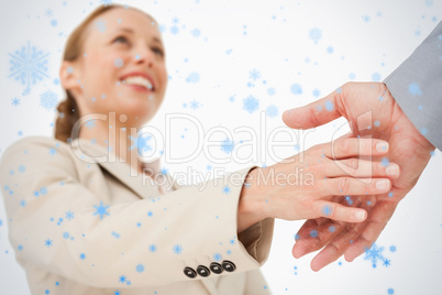 Low angleshot of a woman shaking hands