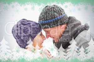 Happy mature couple in winter clothes embracing