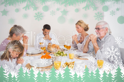 Composite image of family saying grace before eating a turkey