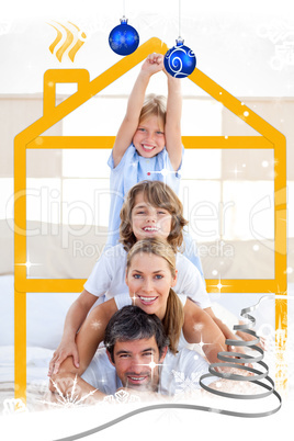 Family having fun with yellow drawing house