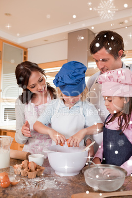 Portrait of a family baking