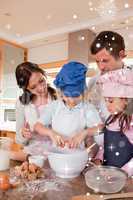 Portrait of a family baking