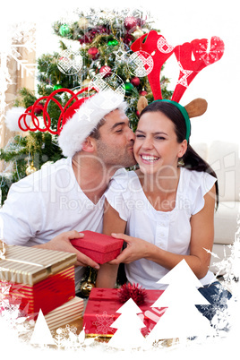 Smiling couple giving presents for christmas