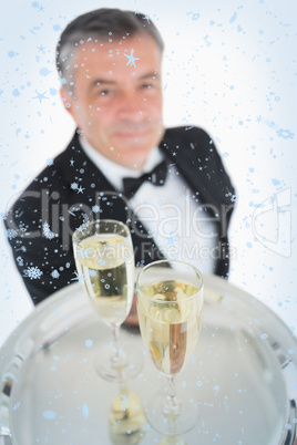 Close up of tray with glasses of champagne