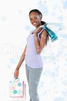 Composite image of close up of happy woman with her shopping on