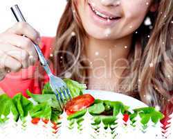 Close up of a delighted woman is eating a salad