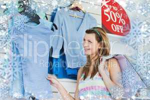 Composite image of delighted woman choosing clothes