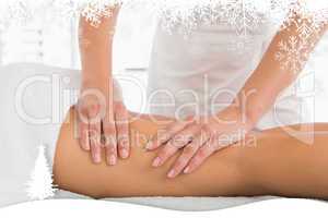 Close-up of a woman receiving leg massage